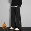 Calças impermeáveis forradas com fleece para outono e inverno, calças de trabalho retas largas da moda masculinas para atividades ao ar livre, calças casuais grossas