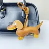 Pendente Dachshund Mais Vendido Transfronteiriço Criativo Pendente de Bolsa Couro PU Dachshund Fofo Chaveiro de Carro Dachshund Presente