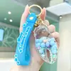 Llavero de cangrejo de pinza con arena movediza y aceite, lindo colgante de frijol de caramelo flotante para llave de coche, accesorio para mochila de estudiante