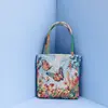 Bolsa de mano bordada con hilo de oro de estilo étnico, bordado a doble cara, bolsa tejida de estilo Harajuku transfronteriza con dibujos animados