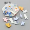 Accesorios DIY serie estilo océano resina cangrejo pantuflas delfín hueso de pez ancla botella a la deriva colgante