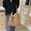 Bolsa de Praia Tecida Vazada Estilo Novo 2026 Bolsa de Mão Versátil Bolsa de Ombro Grande Capacidade Bolsa Tote para Férias na Praia