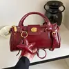 Bolsa transversal de ombro único casual fashion elegante de cor sólida simples nova para 2026, bolsa de mão simples popular e bolsa de axila