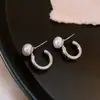 Pendientes de perlas de cola de pez con flores huecas de estilo europeo y americano con aguja de plata, pendientes de temperamento exagerado, pendientes de alta calidad de la industria pesada