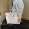Bolso tote de gran capacidad a la moda para el día a día 2026 Nuevo diseño de nicho coreano bolso de hombro lindo estampado