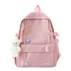 Mochila nueva y linda estilo coreano con colgantes, color liso, mochila juvenil para estudiante, versátil, moderna, dulce y casual