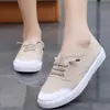 Zapatos de Lona de Caña Baja Nuevos 2025 Zapatos Planos Casuales para Estudiantes Zapatos de Mujer Slip-On Zapatos Perezosos Zapatos Blancos Dropshipping