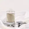 Vendiendo Botella de Perfume Cilíndrica 50ml Botella de Perfume de Vidrio Botella de Perfume de Vidrio Pulido de Gama Alta Tapa de Botella de Perfume
