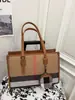 Bolsa de Ombro Feminina Grande Capacidade Estilo Coreano 2026 Novo Modelo Bolsa de Mão Simples Listrada Vertical Casual Sacola Tote Moda