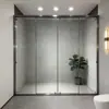 Diseño de Sala de Ducha Integrada Personalizada con Borde Tipo Pantalla, Puertas Dobles Deslizantes Ocultas y Cabina de Ducha de Vidrio