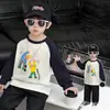 Elegante camiseta de manga larga para niños, colección de otoño 2026, nuevo diseño con mangas raglán, top versátil como capa base para bebés