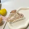 Jiayue Joyería Diseño Simple Versátil Estilo Nube Hueco Pinza Tiburón Parte Trasera de la Cabeza Pasador Accesorio para el Cabello