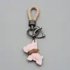 Transfronterizo en stock lindo mini coche de pelea de método llavero colgante de cachorro de cuero cuerda trenzada llavero anti-pérdida