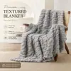 Manta de franela jacquard de fábrica BSCIOEKOTEXGRS, manta decorativa de estilo de lujo ligero, suave y cálida, disponible para exportación y personalizable