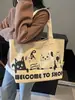 Bolsa Casual de Lona para Mulheres 2025 Nova Versátil Grande Capacidade Bolsa de Ombro Desenho Animado Graffiti Bolsa Tote Moda