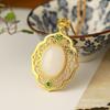 Xinjiang Golden jade ovo superfície pingente luxo incrustado Dongling jade pingente Jade joias de presente atacado