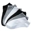 Calcetines empaquetados individualmente calcetines de media pantorrilla para hombre otoño e invierno absorbentes de sudor transpirables calcetines de media pantorrilla para hombre de negocios color liso antiolor Zhuji