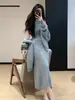 2026 Principios de Primavera Nuevo Estilo Coreano Suéter Cardigan Holgado Color Sólido Cuello Alto Sin Mangas Ajuste Delgado Tejido Falda Larga Conjunto de Dos Piezas para Mujer