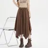 Falda de cola de golondrina de diseño irregular para mujer, nueva falda midi adelgazante de cintura alta para otoño e invierno con cinturón, falda de gamuza