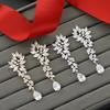 Pendientes de boda personalizados de estilo europeo y americano, pendientes de gota de circonita con incrustaciones de cobre de alta calidad, venta directa al por mayor de fábrica