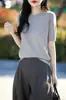 Estilo Novo Primavera e Verão 2026 Tricô de Algodão Puro Gola Redonda Manga Curta Feminino Cor Pura Solto Pulôver Top Camiseta