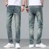 Jeans retro de alta gama para hombre, pantalones casuales rectos de primavera, 2026 nuevos pantalones versátiles de moda para primavera y otoño