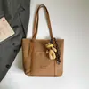 Bolsa Transfronteriza de Gran Capacidad para Mujer Otoño 2026 Nuevo Versátil Moda Hombro Único Tendencia Viaje de Negocios Retro Casual Bolsa de Mano