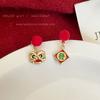 Pendientes de botón de la fortuna del león rojo de Año Nuevo de estilo chino, pendientes asimétricos de diseño de nicho para mujer, pendientes de otoño e invierno de alta calidad