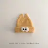 Gorro de inverno infantil, quente e espesso, com um design engraçado apresentando olhos grandes, estilo de puxar e proteção para as orelhas, adequado para meninos e meninas, e estiloso