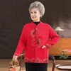 Ropa exterior gruesa forrada de polar para otoño e invierno para mujeres de mediana edad y mayores, estilo traje Tang festivo rojo, cárdigan cálido de abuela
