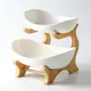 Plato de frutas creativo de doble capa multicapa estilo europeo de cerámica para frutas secas con soporte de bambú plato de sushi para el hogar cesta de frutas directo de fábrica
