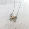 Pendientes de Botón Exquisitos Versátiles de Temperamento con Perlas y Lazo Hueco de Doble Capa Moda Estilo Minimalista Simple Nicho