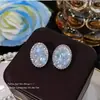 Nuevos Pendientes de Botón Ovalados Azules de Cristal 2026 para Mujer, Pendientes Elegantes de Alta Gama con Diseño Único para Hacer que el Rostro Parezca Más Pequeño