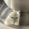 Anillo de arcoíris con diamantes brillantes para mujer, diseño de nicho ligero y lujoso, con circonitas irregulares, de lava y caramelo, ajustable.