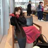 Nuevo Vestido de Punto con Cuello Alto para Mujer Estilo Francés 2025 con Abrigo y Falda de Suéter por Encima de la Rodilla para Otoño e Invierno