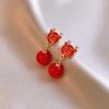 Aretes de borla de petardos de carácter fu de gota de aceite de aguja plateada temperamento moderno ambiente festivo sentido tachuelas para las orejas diseño de celebridad de Internet aretes con sentido del diseño