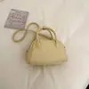 Bolso de mano minimalista de nicho estilo coreano para mujer, nuevo modelo primavera 2026, elegante y exquisito, bolso versátil de hombro y cruzado