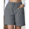 Pantalones cortos casuales de lino holgados de nuevo estilo para verano, transfronterizos europeos y americanos, con bolsillos, color liso, talla grande, de pierna ancha y cintura alta para mujer
