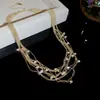 Collar de borla de calabaza de acero de titanio con piedra ojo de gato artificial, acero inoxidable y circonita, moda de lujo ligero, cadena para clavícula, collar de alta gama