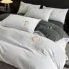 Conjunto de Roupa de Cama de Veludo de Leite Quatro Peças Inverno Veludo Coral Espessado Folha de Cama Outono e Inverno Capa de Edredom Saia de Cama Conjunto de Três Peças Roupa de Cama