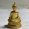 Atacado Estilo Antigo Angustiado Colecionável Cobre Dourado Auspicioso Estilo Xizang Pequena Estátua de Buda Estátua de Cobre Ornamento Artesanato