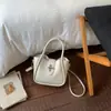 Bolsa de mão feminina de nicho com asas 2026 nova tendência primavera popular bolsa de ombro de alta qualidade bolsa transversal para o dia a dia