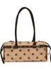 Bolso de axila de lunares estilo coreano de nicho para mujer, nuevo de moda otoño 2026, versátil, de alta gama, para ir al trabajo, de hombro y cruzado