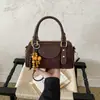 Colección de otoño 2026 transfronteriza: bolso de hombro elegante y versátil con un diseño único, gran capacidad y perfecto para ir al trabajo