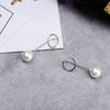 Pendientes sencillos de perlas al estilo coreano de Corea del Sur, joyería con gancho para la oreja, joyería para la oreja, pendientes elegantes de perlas largas con forma de cara y línea.