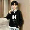 Camiseta de Manga Larga Waffle con Estampado de Dibujos Animados Elegante, Estilo Nuevo Primavera y Otoño 2026 para Niños Mayores, Atuendo Popular Versátil