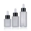 Botella cuentagotas de hombro plano de 20 ml Botella de esencia de hombro recto de 30 ml Botella de loción de 50 ml Vidrio transparente esmerilado Sub-paquete de aceite esencial