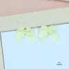Atacado direto da fábrica fita de um centímetro enrolada laço pequeno acessórios para lingerie flor