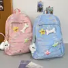 Mochila de estilo japonês muito estilosa para estudantes universitários, fofa e moderna para o estilo soft girl, adequada para o ensino fundamental II e médio, versátil e de grande capacidade