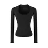 Camiseta básica para mujer, escote pronunciado, manga larga, elástica, ajustada y que realza la figura, perfecta como capa interior para otoño, con un diseño elegante y moderno.